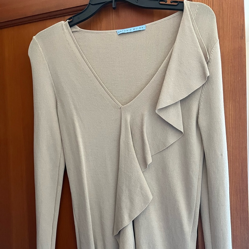 Ruffled long sleeve knit top